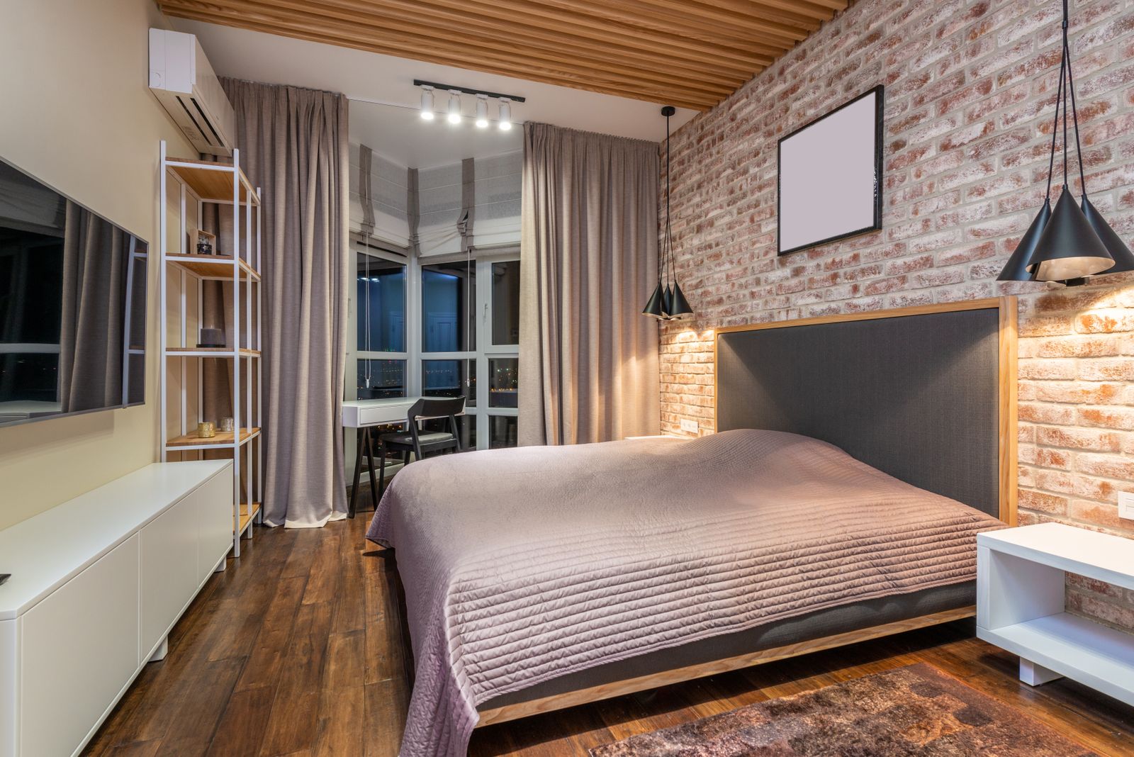 Small rented apartment bedroom